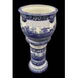 COPELAND SPODE; a 19th century blue and white jardinière on stand, diameter 40cm, height 91cm (