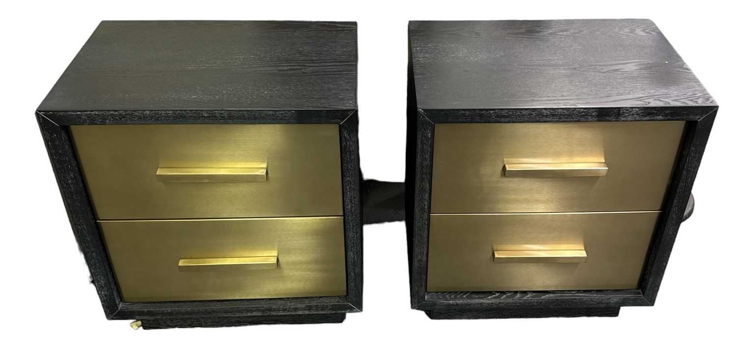 A pair of modern two drawer bedside tables, with brass clad fronts to the drawers, width 55cm, depth