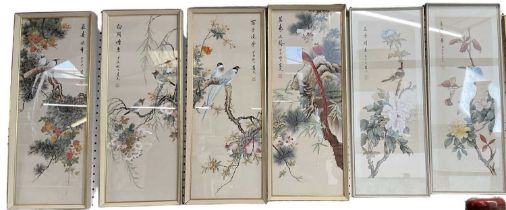 A set of six 20th century Chinese watercolours on silk, all depicting birds amongst foliage, with