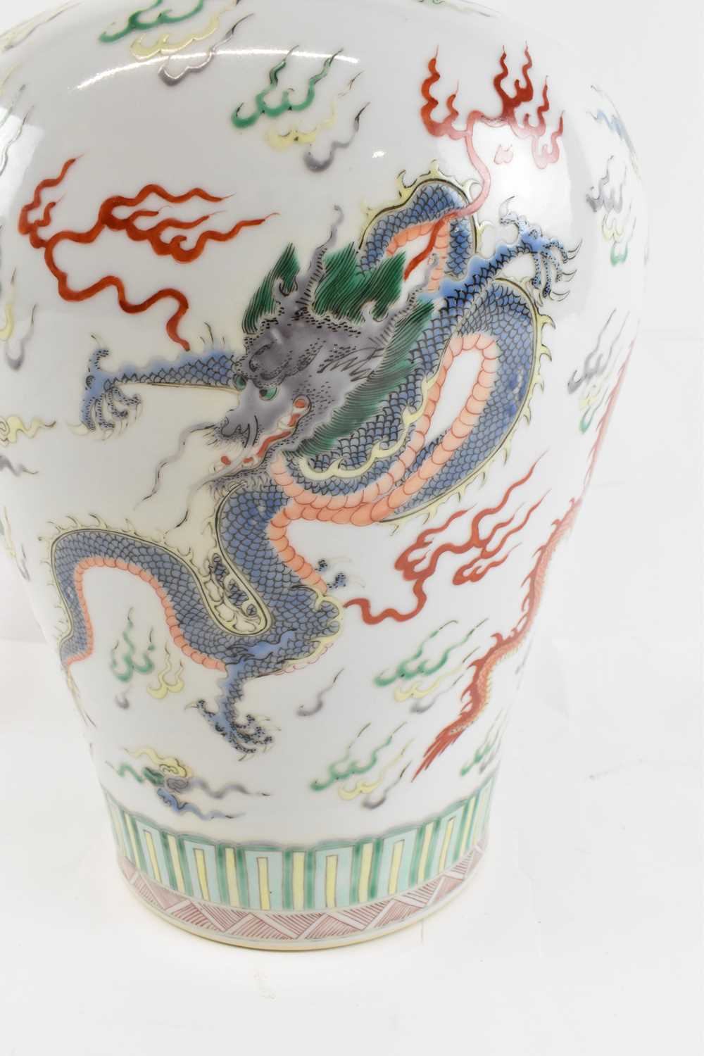 A Chinese porcelain vase decorated with dragons, with a six character mark to base, height 33cm. - Image 2 of 4