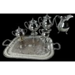 A four piece silver plated tea and coffee service on twin handled tray comprising teapot, coffee