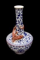 A 20th century Chinese blue and white vase, with dragon decoration around the neck, with Qianlong