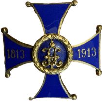 A Russian Empire 94th Yenisei Infantry Regiment blue enamelled cap badge, inscribed '1813' and '