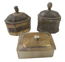 A bronzed white metal lidded pot with decoration of a head to the top, height 13cm, a hardstone