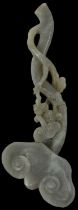 A Chinese carved green hardstone sceptre decorated with a monkey climbing the central branch, length