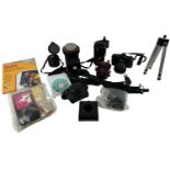 A quantity of cameras and lenses including a Pentax Asahi camera, Tamron 28mm lens, Pentax lens,