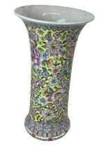 A 20th century Chinese yellow ground floral decorated vase, height 31cm.