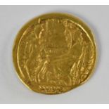 A Constantius II Roman gold coin, diameter 2cm, approx 4.3g.