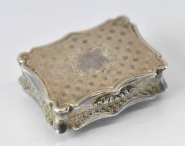 NATHANIEL MILLS; a small early Victorian hallmarked silver vinaigrette with pierced gilt interior,
