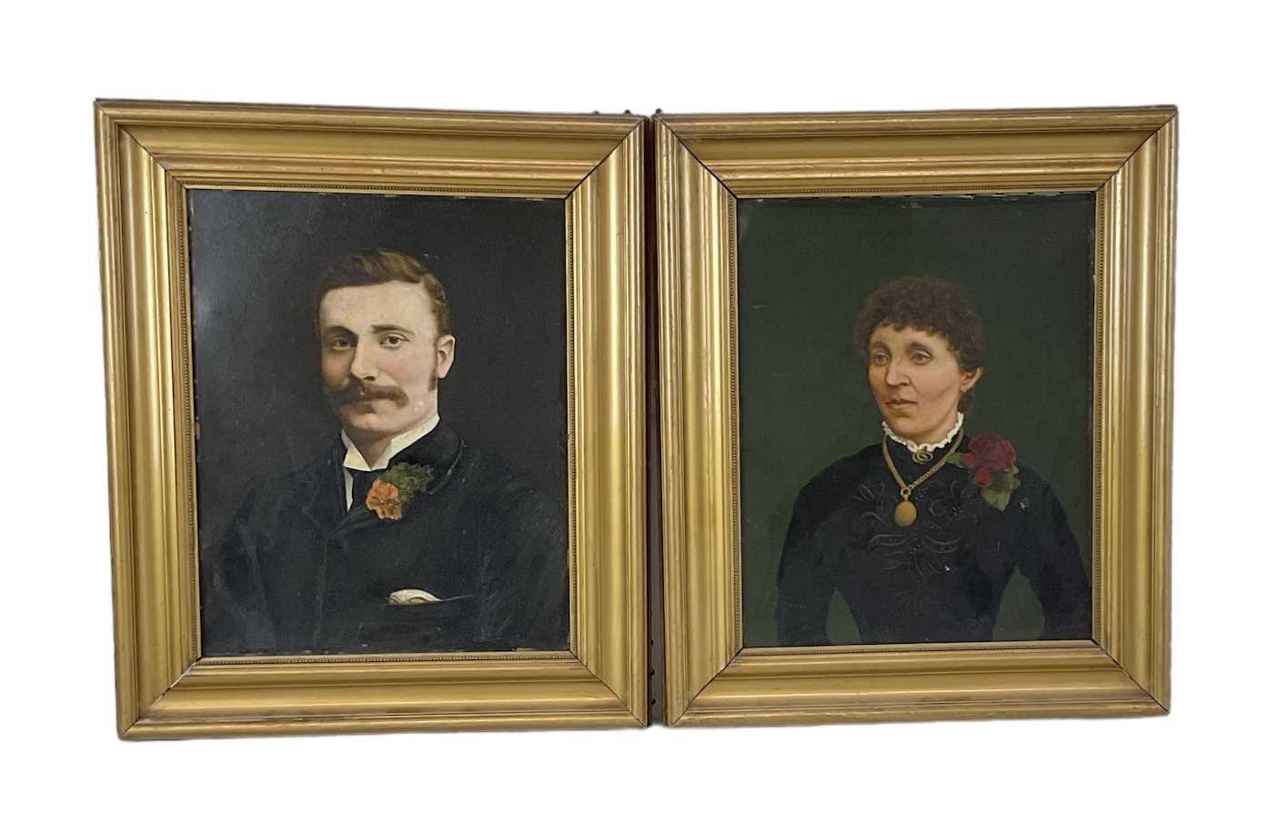 A pair of 19th century oil on board portraits of a lady and a gentleman, both 38 x 30cm, gilt