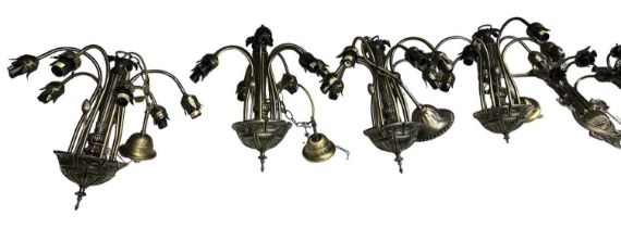 A set of four metal framed seven branch Art Nouveau style ceiling lights with frosted glass