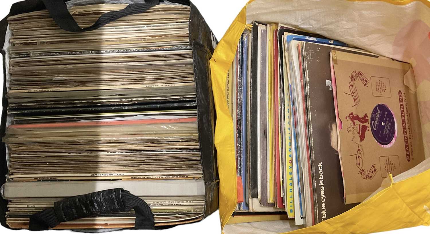 A large quantity of records including Frank Sinatra, Queen, etc.