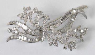 A fine Art Deco style precious white metal diamond encrusted floral brooch, length 8cm, diamonds