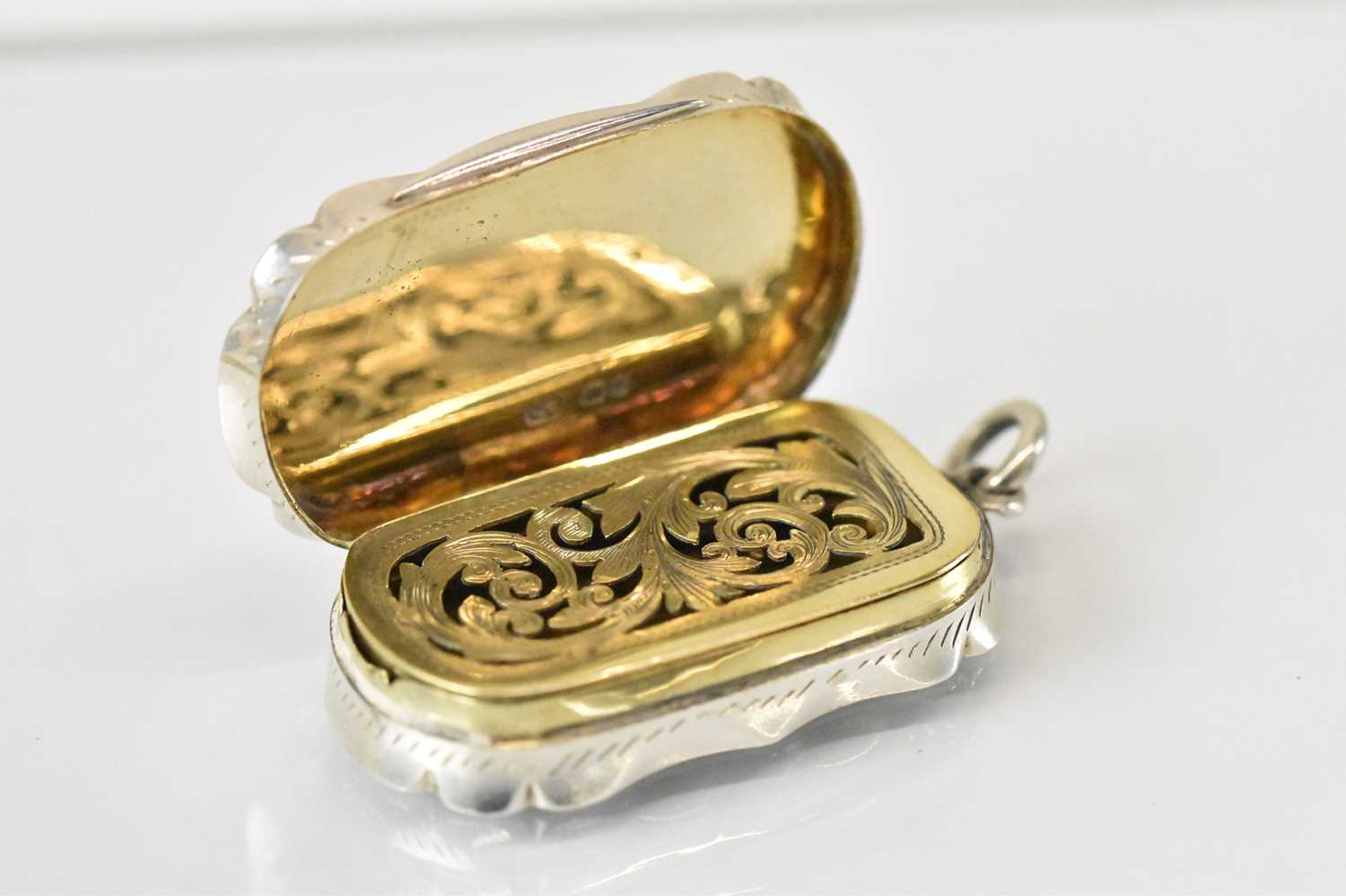 COLEN HEWER CHESHIRE; a Victorian hallmarked silver vinaigrette with pierced gilt interior, - Image 2 of 4