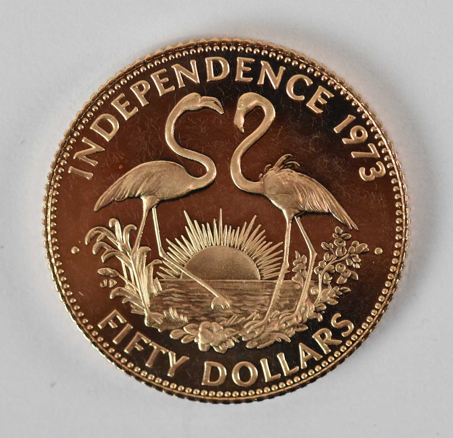 An Elizabeth II Commonwealth of The Bahamas 1973 Independence fifty dollar coin, diameter 2.8cm,