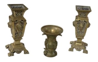 A pair of 19th century brass vases, height 25cm, and a modern Japanese brass vase, height 15cm (3).