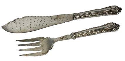 HARRISON BROTHERS; a cased pair of Edward VII hallmarked silver fish servers, Sheffield 1906.