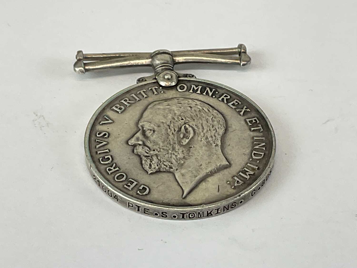 A WWI British War medal awarded to Private S Tomkins CGDS, also a 1939/45 medal (2). - Image 3 of 3