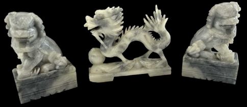 A pair of Chinese hardstone Dogs of Fo, height 12.5cm, and a Chinese carved hardstone model of a