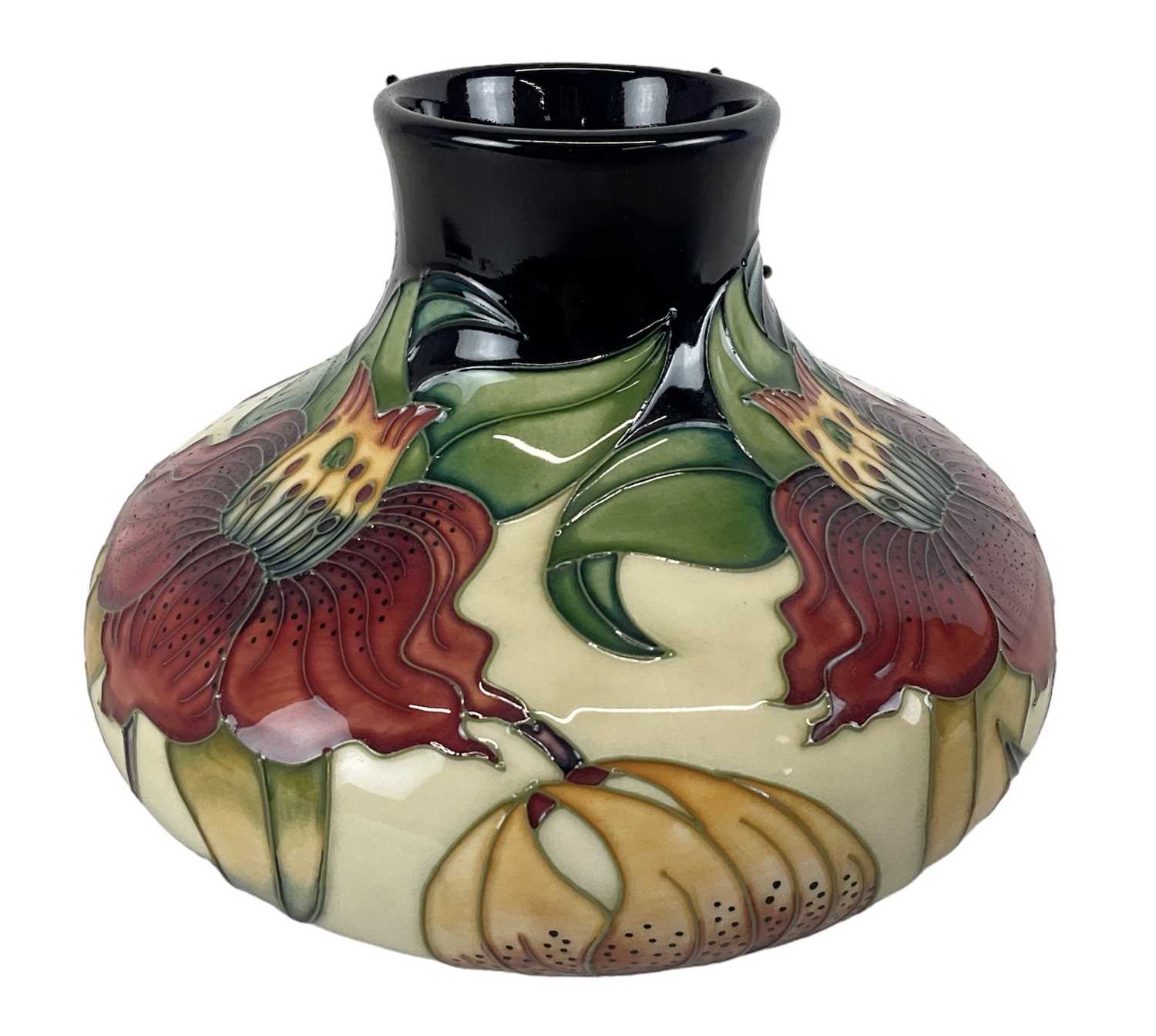 MOORCROFT; a 'Anna Lily' pattern vase, marks to base, height 16.5cm, boxed.