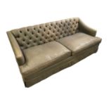 STYLE & COMFORT; a modern green upholstered button back three seater settee, width approx 210cm.