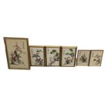 A modern Chinese embroidery of a bird amongst foliage, four character mark upper right, 57.5 x 37cm,