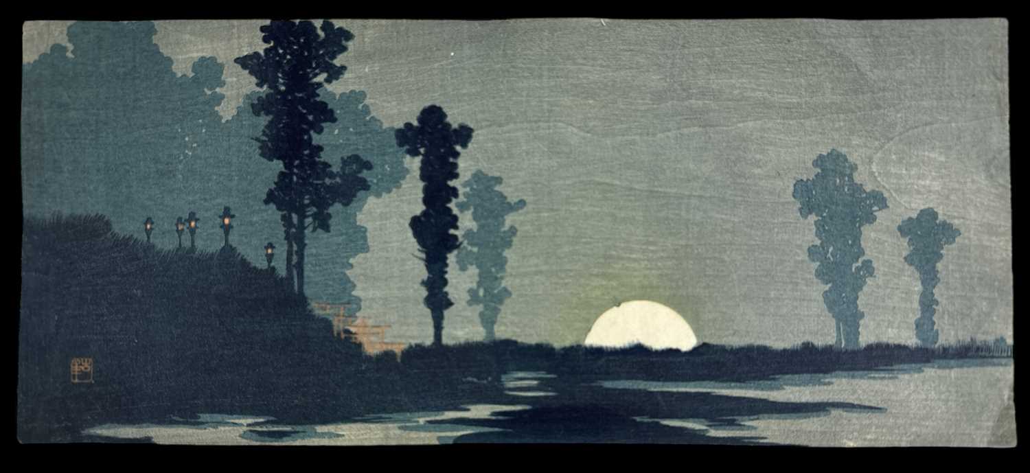 AFTER YOSHIJIRO URUSHIBARA; a Japanese woodcut print, sunset with trees in the foreground, with