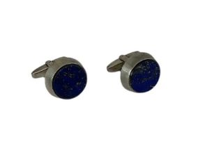 A pair of sterling silver lapis lazuli set cufflinks.