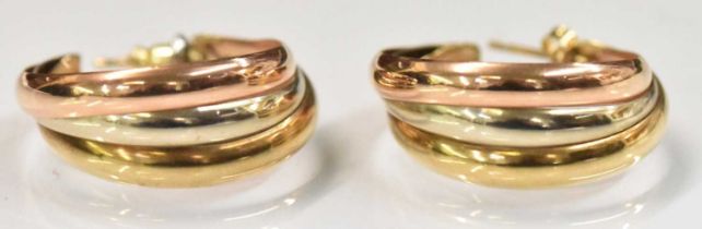 A pair of 9ct tricolour yellow, white and rose gold earrings, combined approx 4.2g.