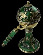 A Russian silver gilt green enamel and jewelled table lighter made to commemorate the Romanov