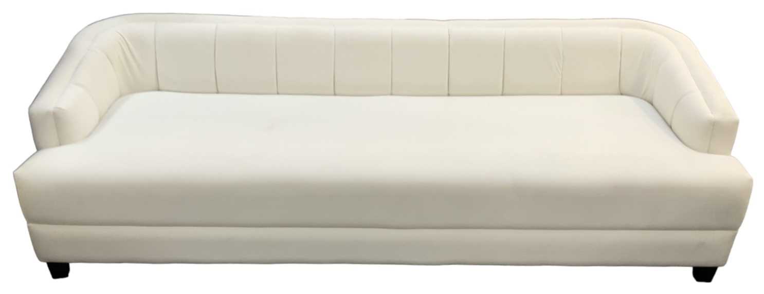 A modern white upholstered sofa, width 245cm.