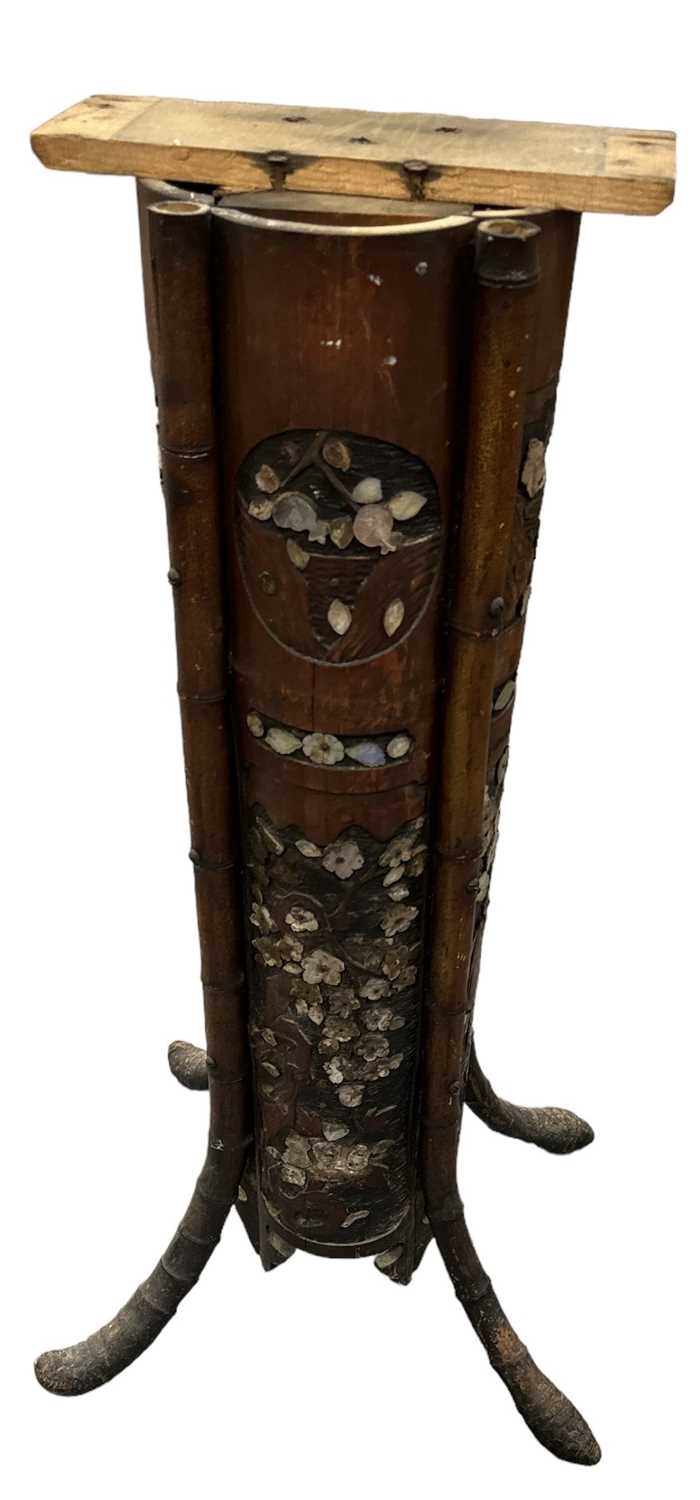 A Japanese bamboo and mother of pearl inlaid display stand (lacking top), height 82cm.