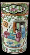 A Chinese Canton Famille Rose porcelain brush pot, decorated with figures and with a gilt rim,