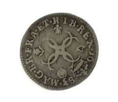 A Charles II silver fourpence dated 1683.