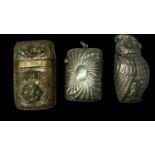 A pewter vesta case modelled as an owl, with hinged lid, height 5.5cm, a silver plated vesta case,