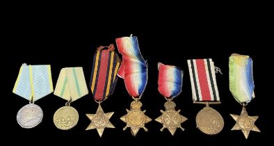 A group of WWI, WWII and Russian military medals including the U.S.S.R. Medal for Distinguished