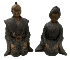 A modern Japanese bronze of a Samurai and his wife, height 29cm.