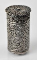 A Continental white metal filigree cylindrical container, height 4.8cm.