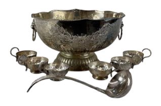 A silver plated punch set comprising large twin handled punch bowl, diameter 33cm, silver plated