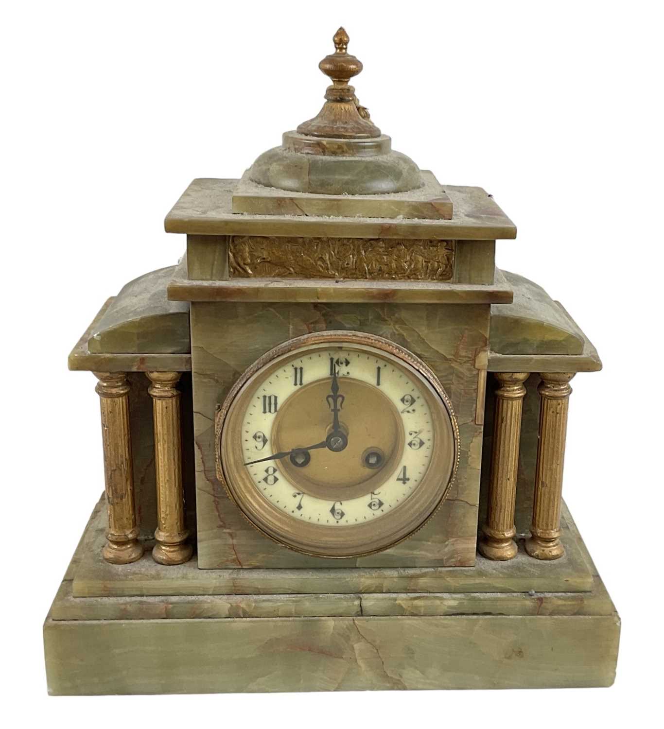 A late 19th century French onyx mantel clock with white enamel dial, height 32cm, width 29cm.
