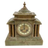 A late 19th century French onyx mantel clock with white enamel dial, height 32cm, width 29cm.