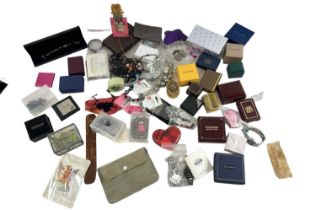 A large quantity of costume jewellery, watches and jewellery boxes including rings, earrings,