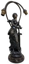 AFTER AUGUSTE MOREAU; a bronze figural two branch table lamp in the form of a female, on marble