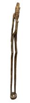 A large 20th century carved African standing figure, height 154cm.