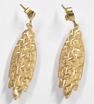 A pair of 9ct yellow gold leaf shaped earrings, combined approx 1.25g.