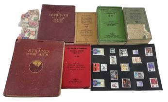 A quantity of early stamp catalogues, a Strand album and a few loose stamps.