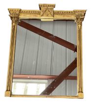 MASONIC INTEREST; a late 19th century gilt framed wall mirror, the pediment decorated with the