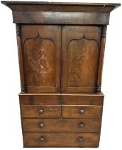 A large 19th century mahogany linen press, with pair of cupboard doors enclosing fixed shelves above