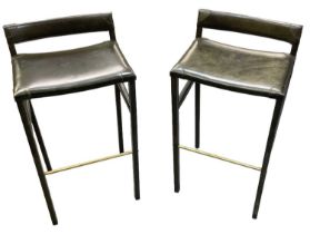 OCHRE; a pair of modern contemporary green leather upholstered bar stools, height 82cm.