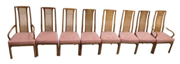 DREXEL HERITAGE FURNISHINGS; a set of eight rattan backed dining chairs with red upholstered